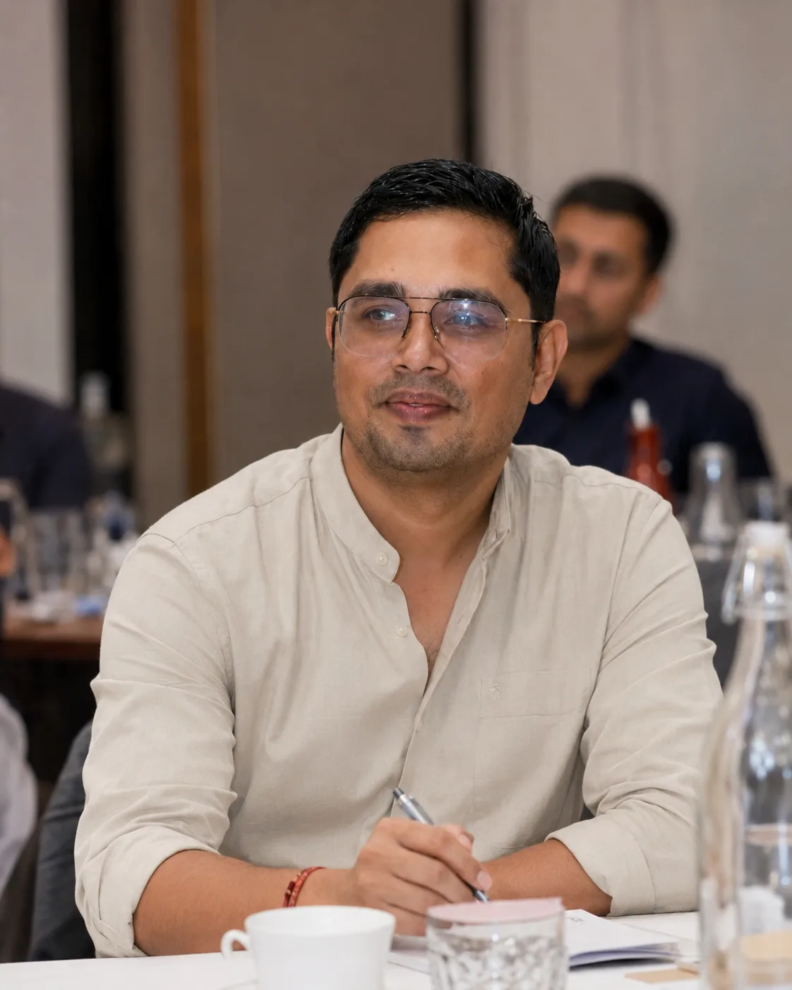 Awanish taking notes during a working session
